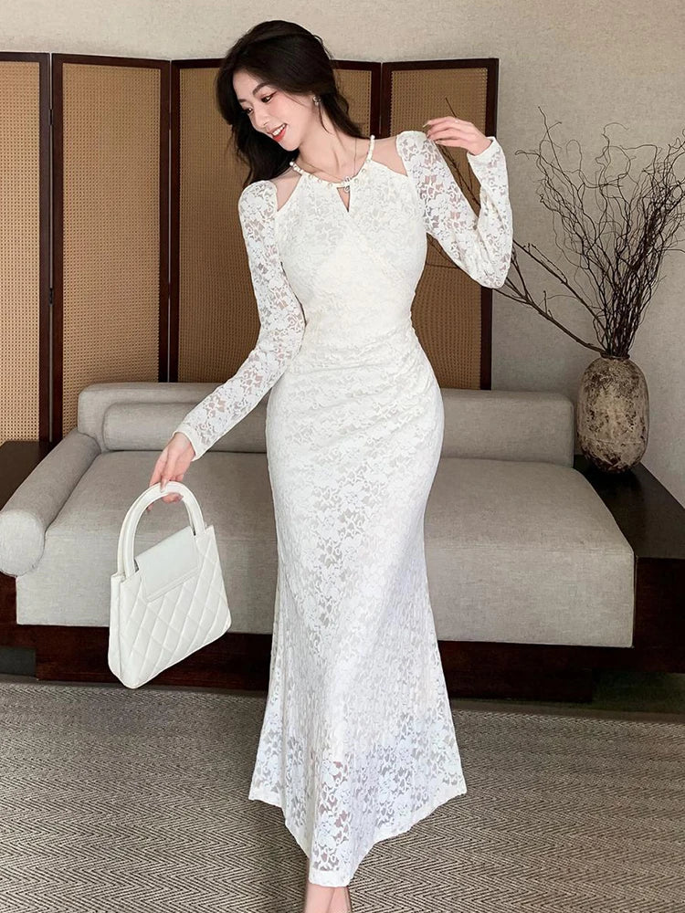 Long White Lace Dress with Cutout Design